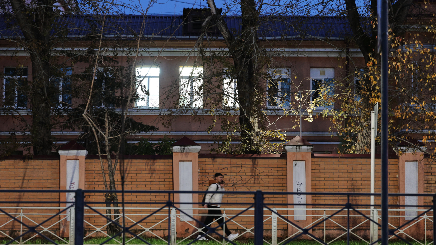 A man walks past the building of the Irkutsk Anti-Plague Research Institute of Siberia and the Far East in Irkutsk, Russia, on Oct. 7, 2026.