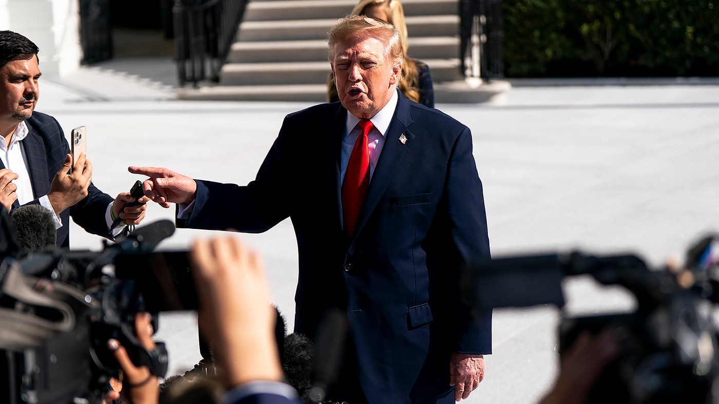 President Trump speaks to reporters before boarding Marine One on the South Lawn of the White House in Washington, D.C., on Oct. 13, 2026. Trump is heading to Alaska and Montana for congressional campaign events.