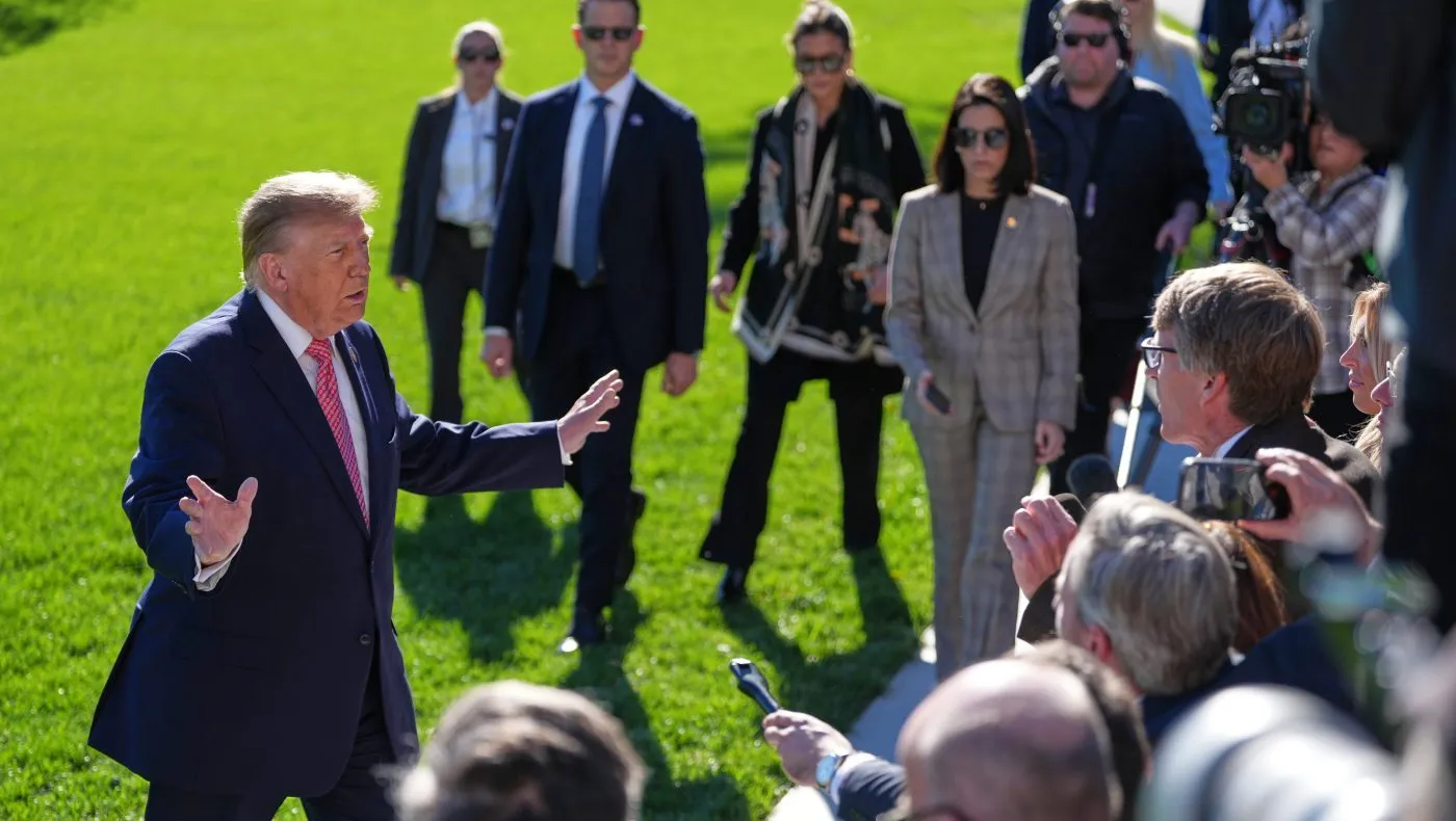 President Trump speaks to the media on the South Lawn of the White House before walking to board Marine One, Monday, Oct. 19, 2026, in Washington.