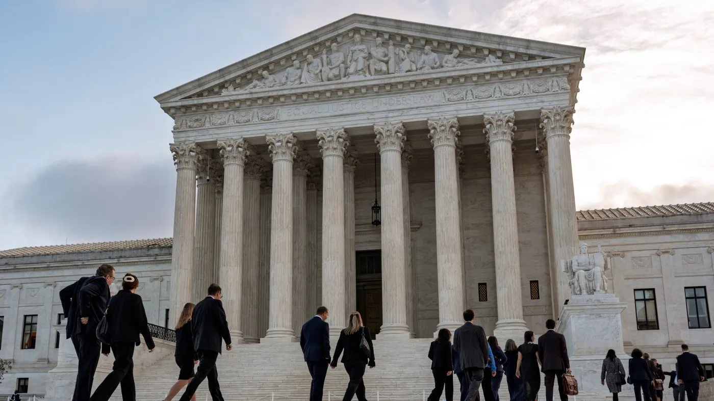 People gather as the Supreme Court begins its new term, on Capitol Hill in Washington, Monday, Oct. 5, 2026. (AP Photo/J. Scott Applewhite)