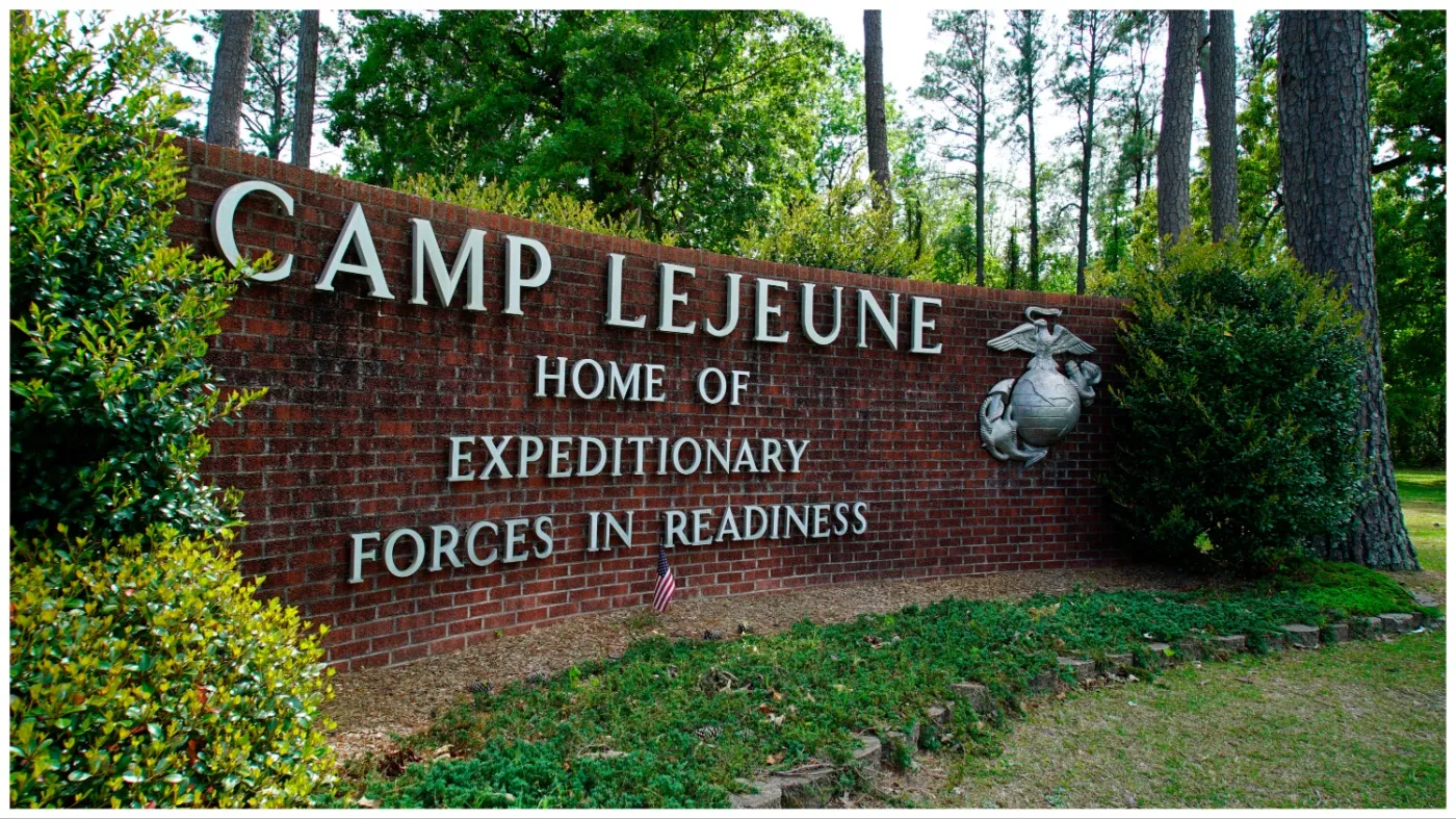 Signage stands on the main gate to Camp Lejeune Marine Base outside Jacksonville, N.C., April 29, 2022.