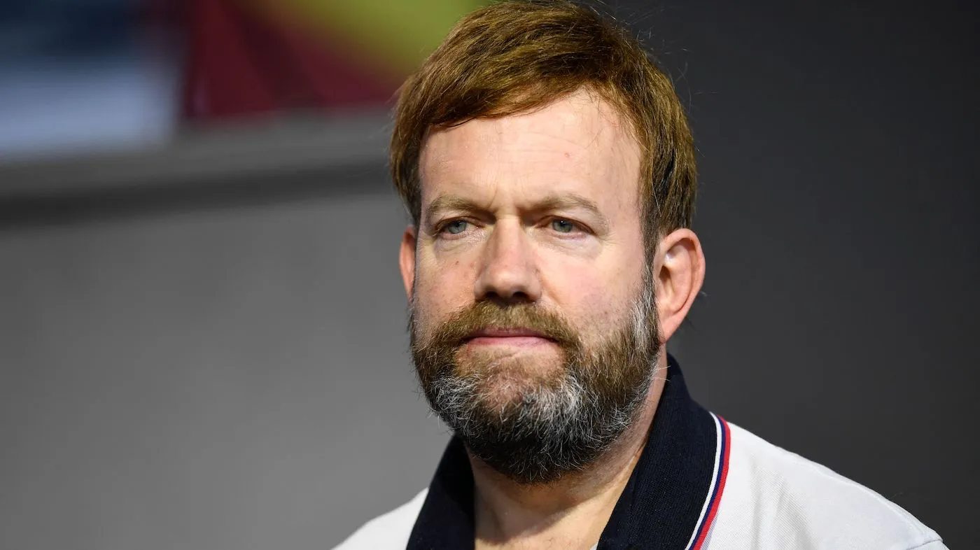 Frank Luntz, CEO of FIL Inc., listens during the Milken Institute Global Conference on Oct. 18, 2021, in Beverly Hills, Calif.
