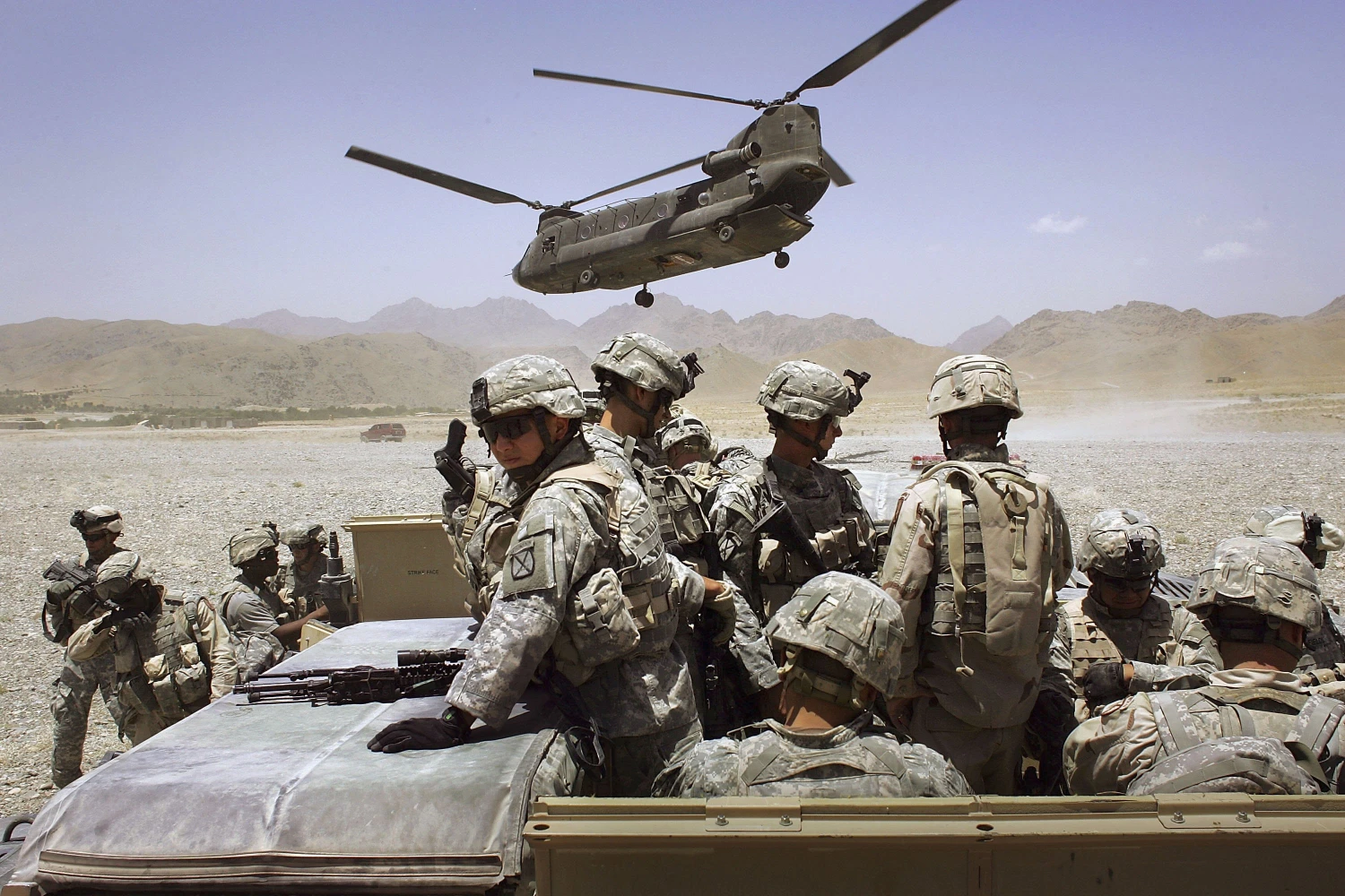 American soldiers from the 10th Mountain Division deploy to fight Taliban fighters as part of Operation Mountain Thrust on June 22, 2006 in the Zabul province of Afghanistan.