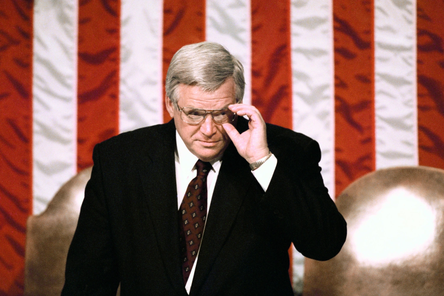 Speaker of the House Dennis Hastert next to his seat in the Congressional Chambers shortly before President Bill Clinton delivers his State of the Union speech before a joint session of Congress on January 20, 1999.