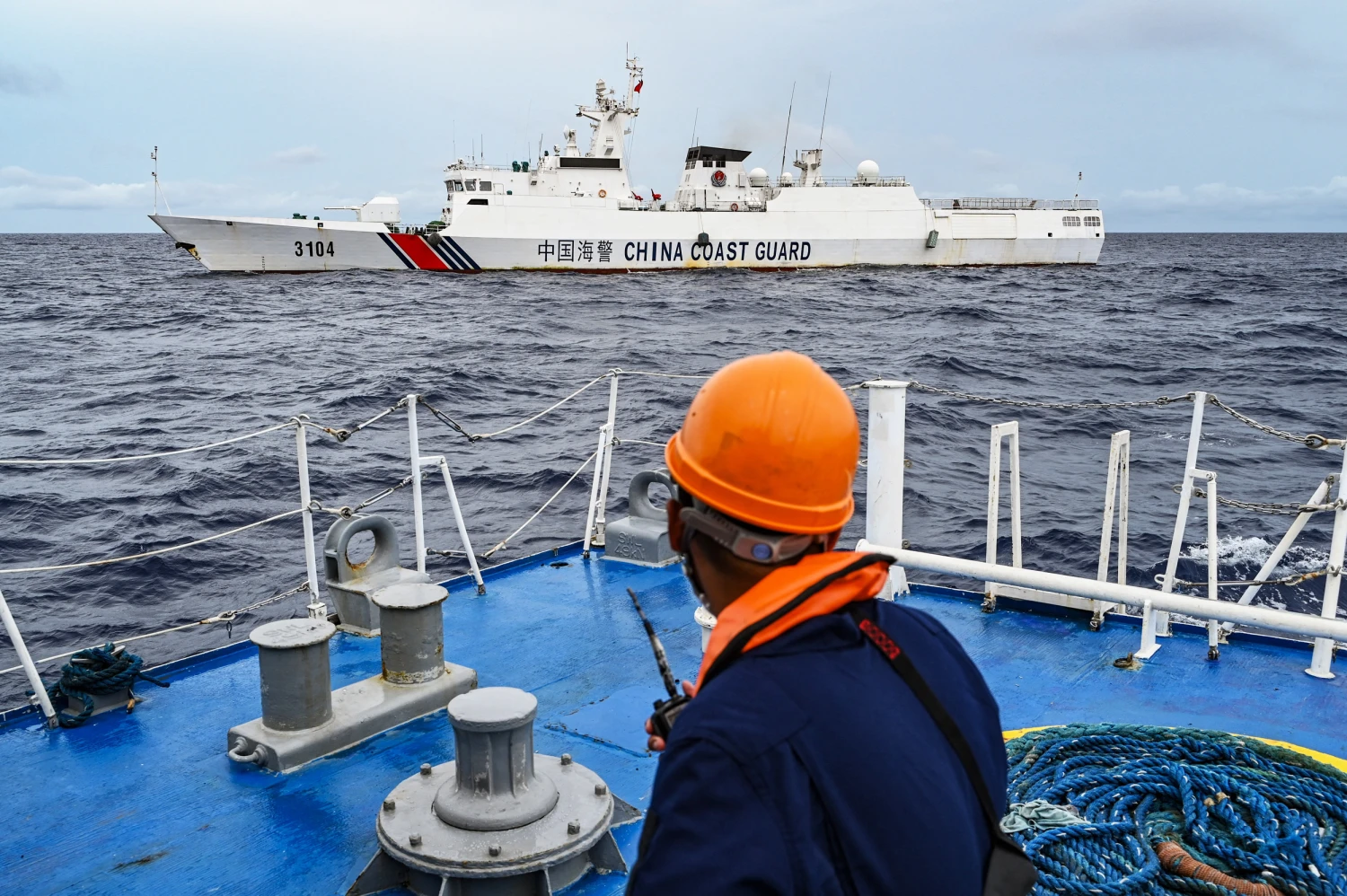 A China Coast Guard ship is seen from the Philippine Coast Guard vessel BRP Cabra in the South China Sea, on Aug.  26, 2024.