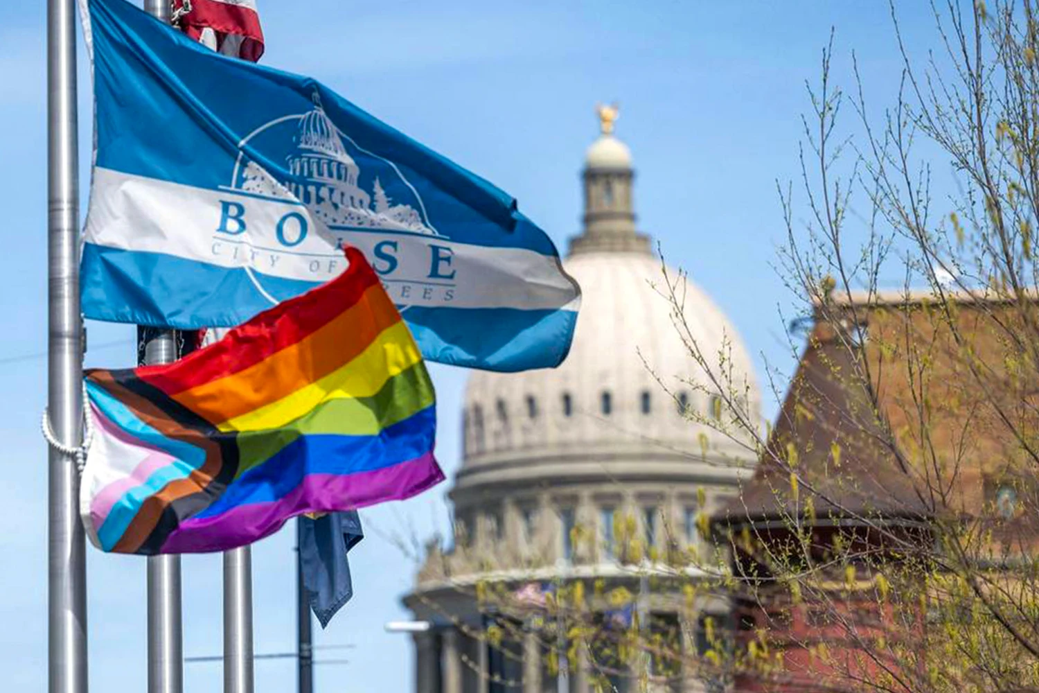 Pride Flag among array of flags in downtown Boise, just over a block away from the Idaho State Capitol Building.