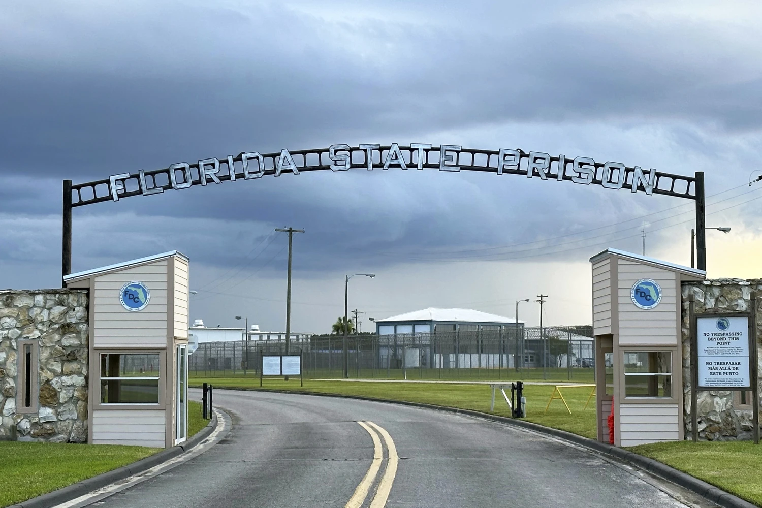 Clouds hover over the entrance of the Florida State Prison in Starke, Fla., Aug. 3, 2023.