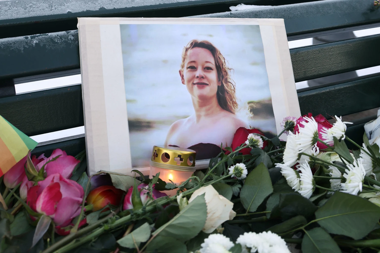 A portrait of Rene Nicole Good at a makeshift memorial in front of the U.S. Embassy in Berlin.