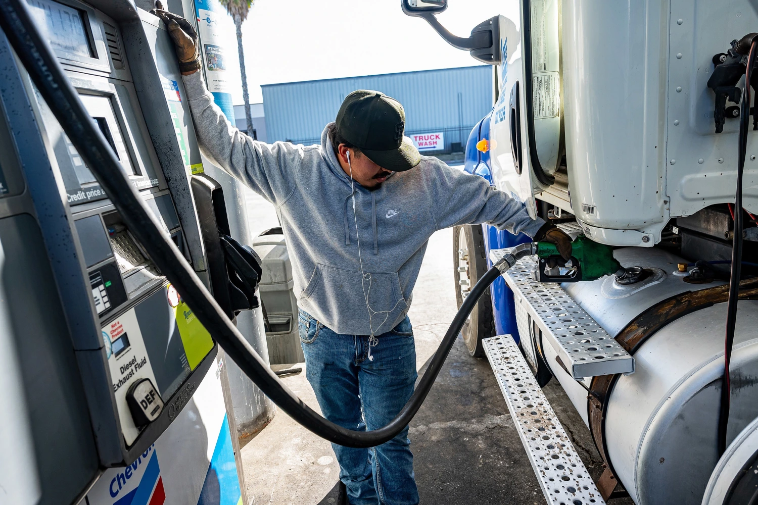 A driver refuels a tractor trailer with diesel fuel at a Chevron truck stop in Tracy, California, US, on Wednesday, March 25, 2026.