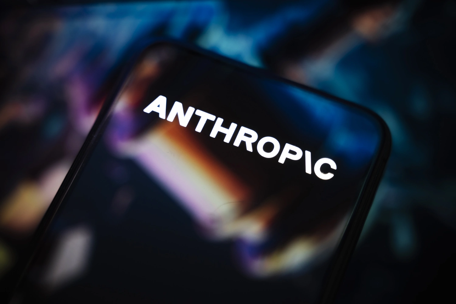 This photograph shows a smartphone screen displaying the logo of Anthropic, an American company specializing in artificial intelligence (AI). It develops Claude, a family of large language models, and is also known for its research in the field of AI safety in Creteil, France, on September 9, 2025.