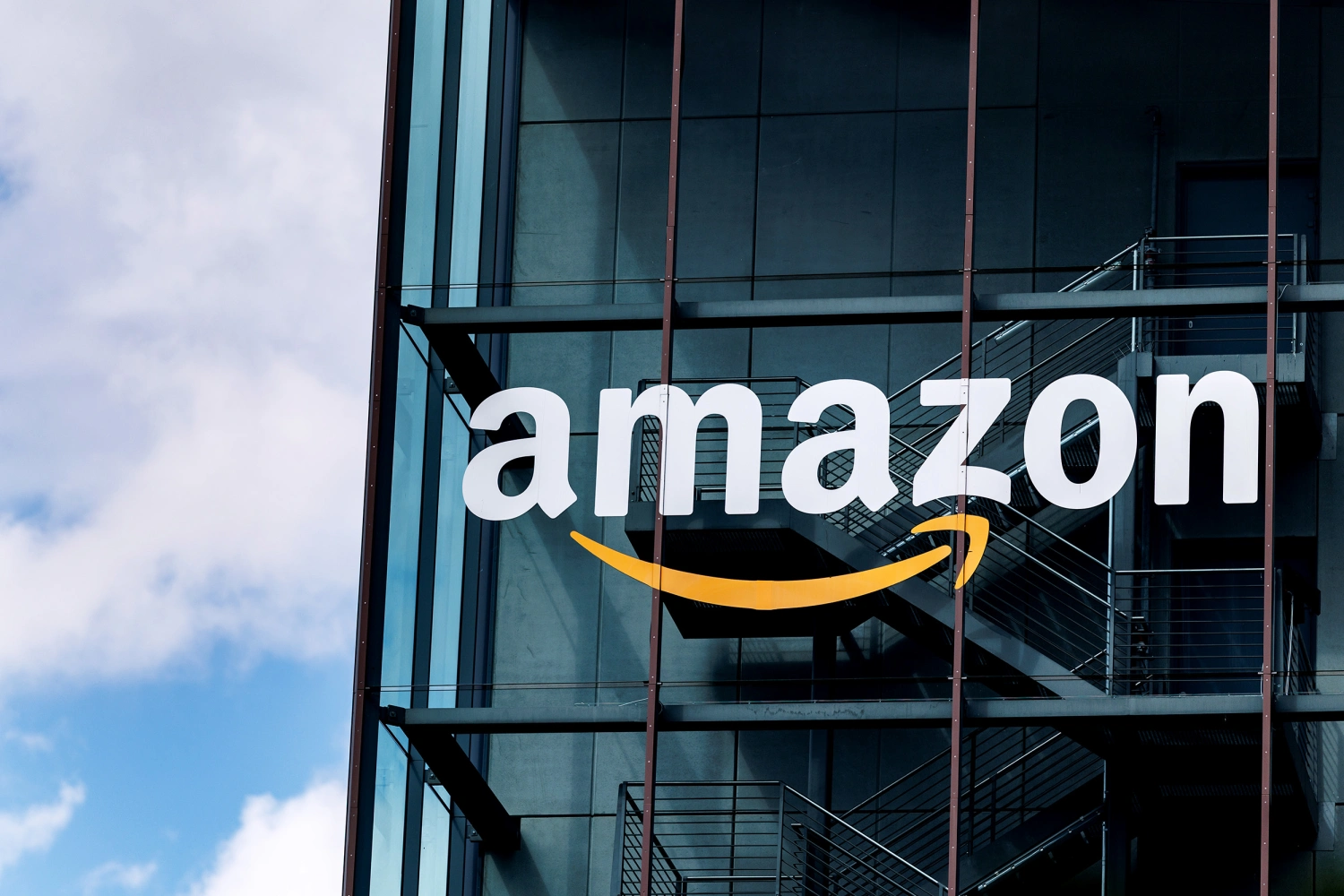 The logo and lettering of global online mail order company Amazon can be seen on the façade of Amazon Germany's headquarters in Parkstadt Schwabing in Munich (Bavaria).