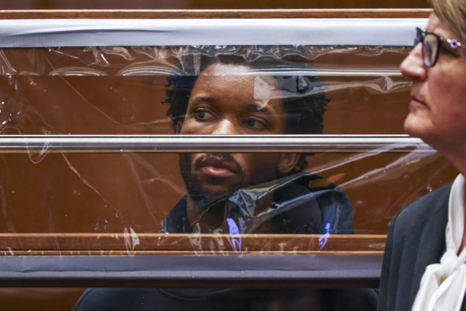 D4vd looks on from behind his defense attorney Marilyn Bednarski during his arraignment for the murder of Celeste Rivas Hernandez at Clara Shortridge Foltz Criminal Justice Center on April 20, 2026 in Los Angeles.