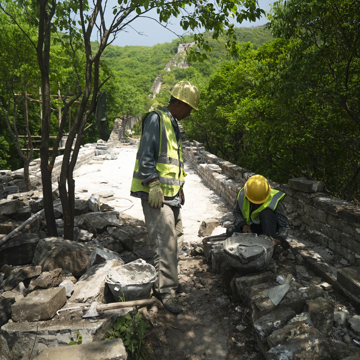 Construction workers at Phase 5 of the Great Wall reconstruction in Jiankou, China on Tuesday.