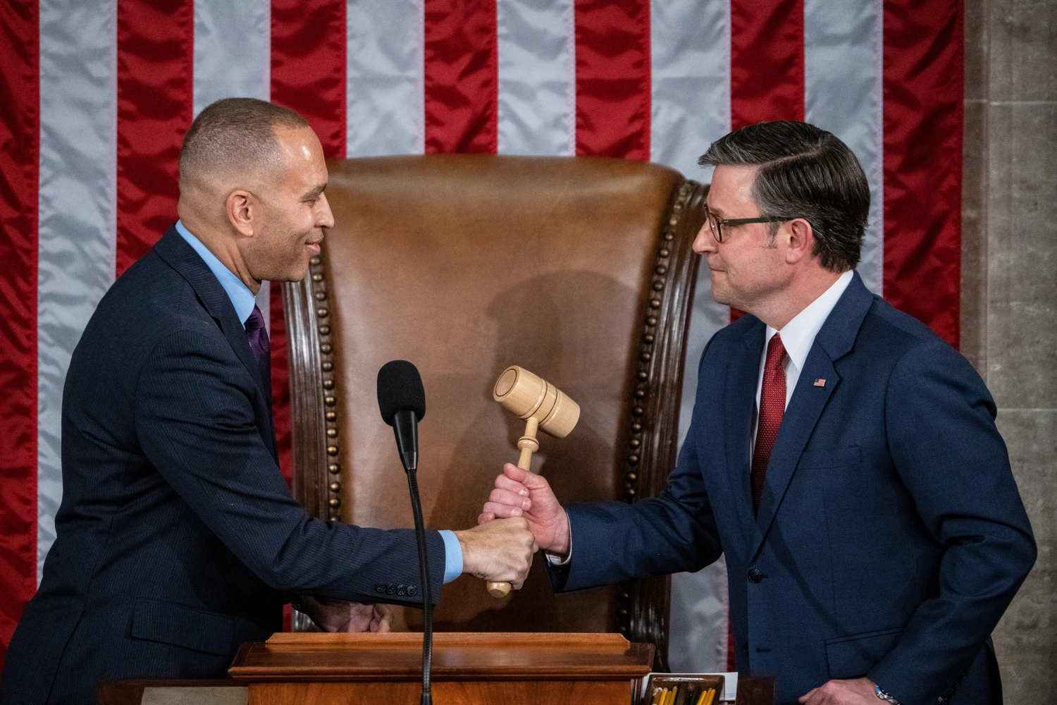Speaker of the House Mike Johnson, R-La., receives the gavel from House Minority Leader Hakeem Jeffries, D-N.Y., left, after Johnson won the speakership for the 119th Congress in the House chamber of the U.S. Capitol on Jan. 3, 2025.