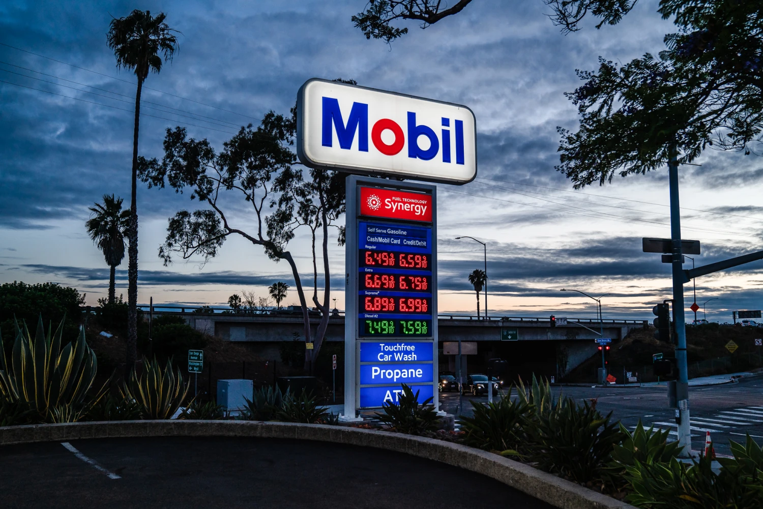 A sign displays fuel prices at a Mobil gas station in San Diego, Calif., on May 4, 2026.