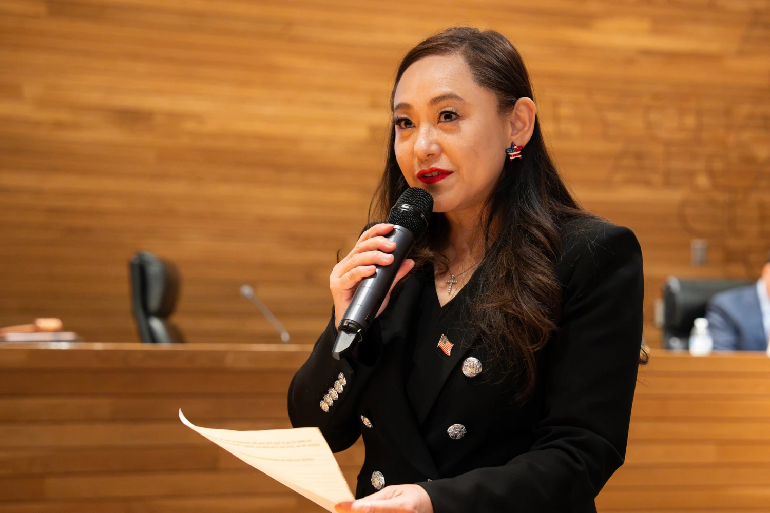 Eileen Wang speaks at City Hall in Arcadia, Calif., in 2025.