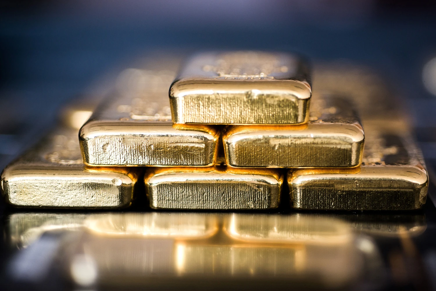 Gold bars sit stacked in this arranged photograph in Hungary.