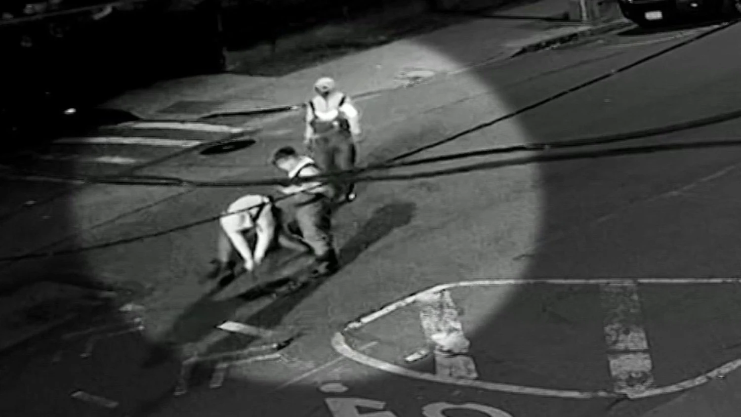 New video shows a group prying open a manhole cover on May 5, 2026, just before 2 a.m. in Astoria, Queens.