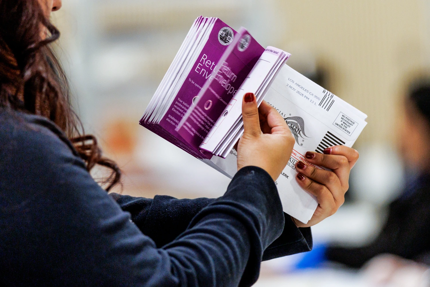 Vote by Mail ballots are inspected at the Los Angeles County Ballot Processing Center on Nov. 4, 2025 in City of Industry, Calif.