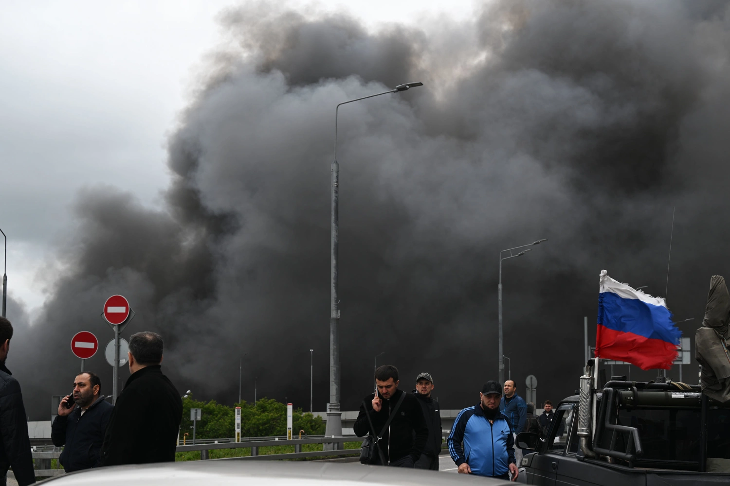 Black smoke billows from the area of Gazprom Neftâs Moscow oil refinery, located on the southeastern outskirts of Moscow, on June 18, 2026, following what the Russian capital's mayor described as a large scale drone attack by Ukraine.