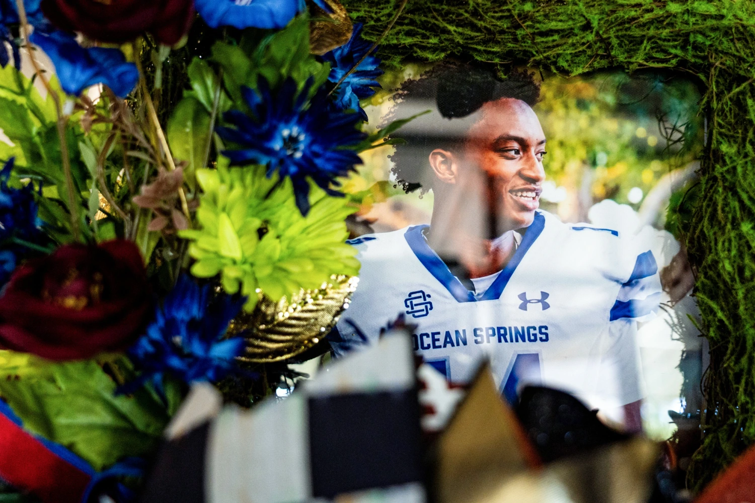A picture of Nolan Wells is displayed during his funeral at Center Pointe Church in Ocean Springs, Miss., on July 20, 2026.