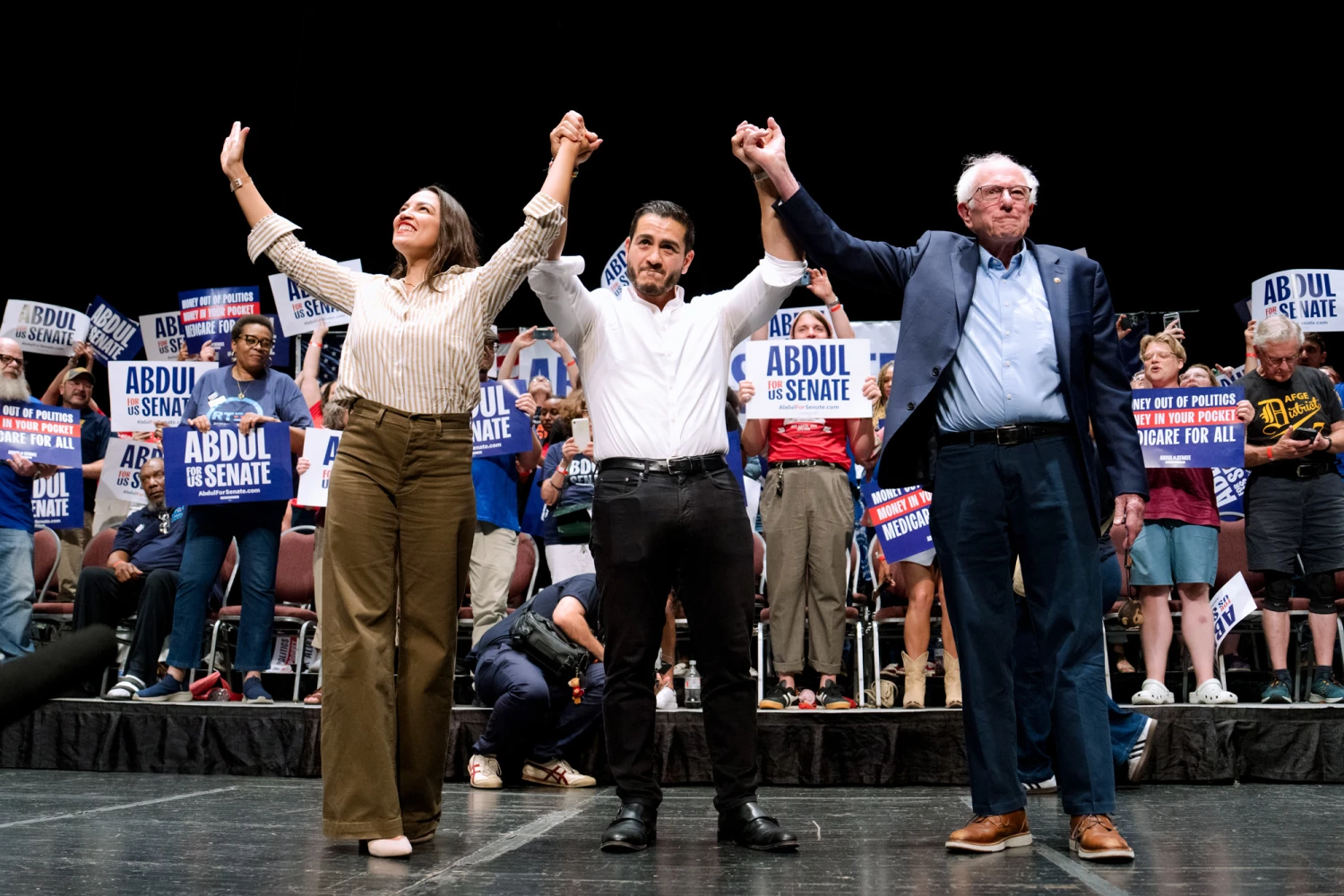 Rep. Alexandria Ocasio-Cortez, D-N.Y., U.S. Senate candidate Abdul El-Sayed, D-Mich., and Sen. Bernie Sanders, I-Vt., during the "The People v. The Powerful" campaign event at the Detroit Opera House in Detroit on July 18, 2026.