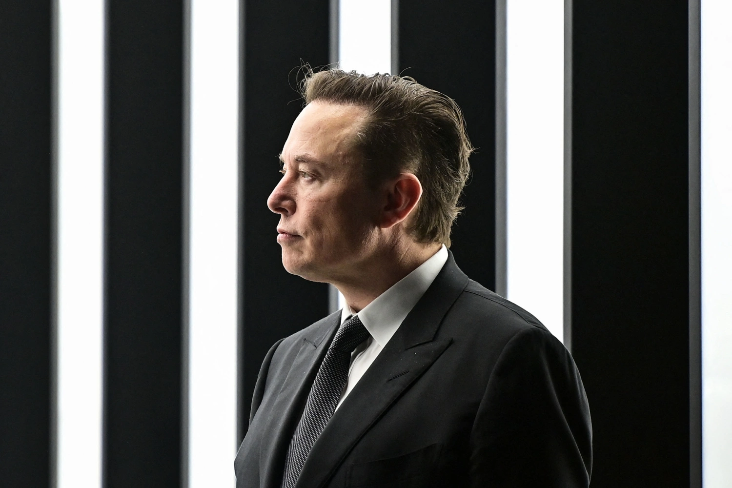 Tesla CEO Elon Musk is pictured as he attends the start of the production at Tesla's "Gigafactory" on March 22, 2022 in Gruenheide, southeast of Berlin.