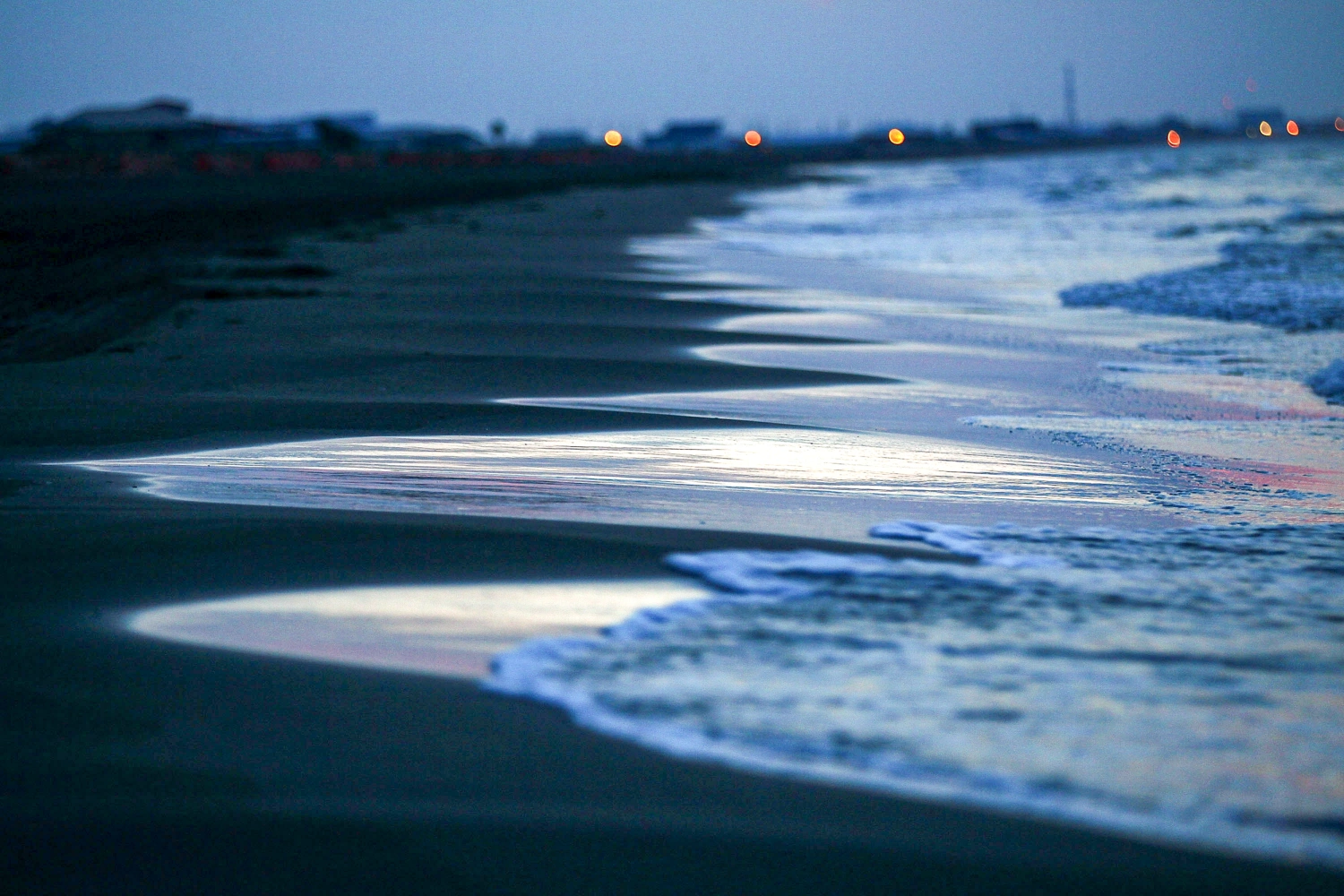 The sun rises over the beach Aug. 13, 2010, in Grand Isle, La.