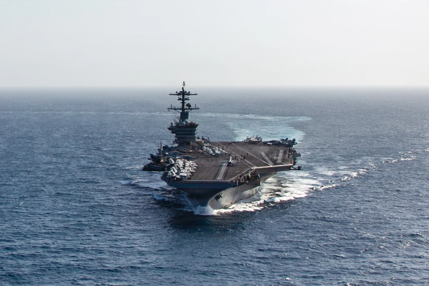 The USS Abraham Lincoln in the Arabian Sea in May. The ship had remained at sea without a port call for 286 days while supporting the U.S. war with Iran.