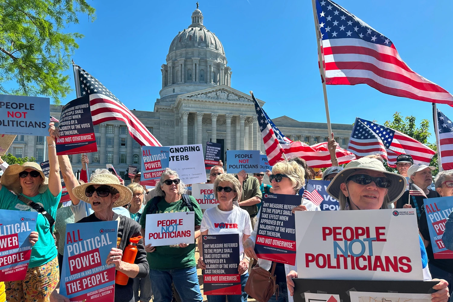 Protesters against a Missouri congressional redistricting plan gather outside the Missouri Capitol on May 12, 2026, in Jefferson City, Mo.