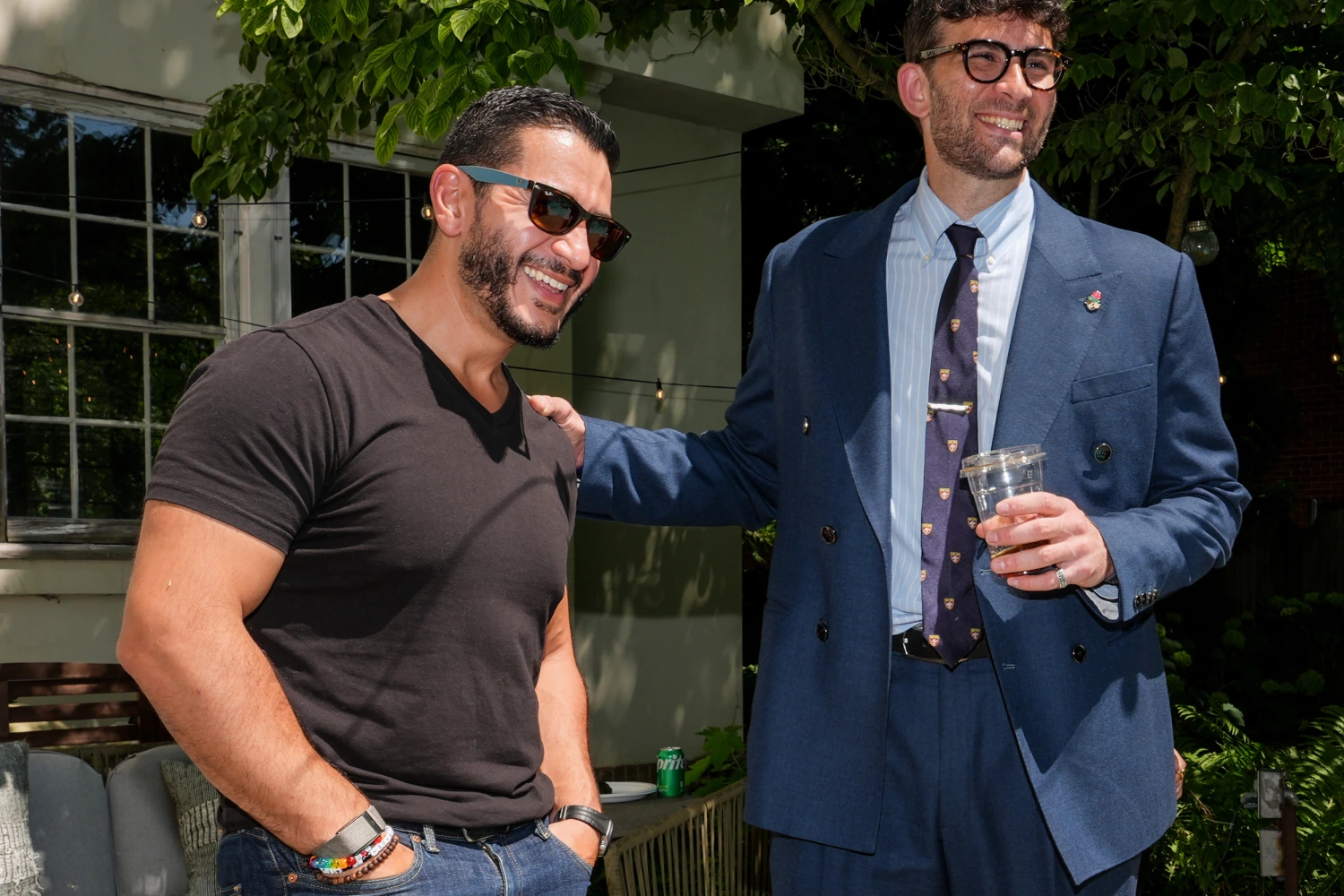 Abdul El-Sayed, a progressive candidate in the Democratic primary for U.S. Senate in Michigan, talks poolside with streamer Hasan Piker at a party for content creators supporting his campaign, Monday, Aug. 3, 2026, in Detroit.