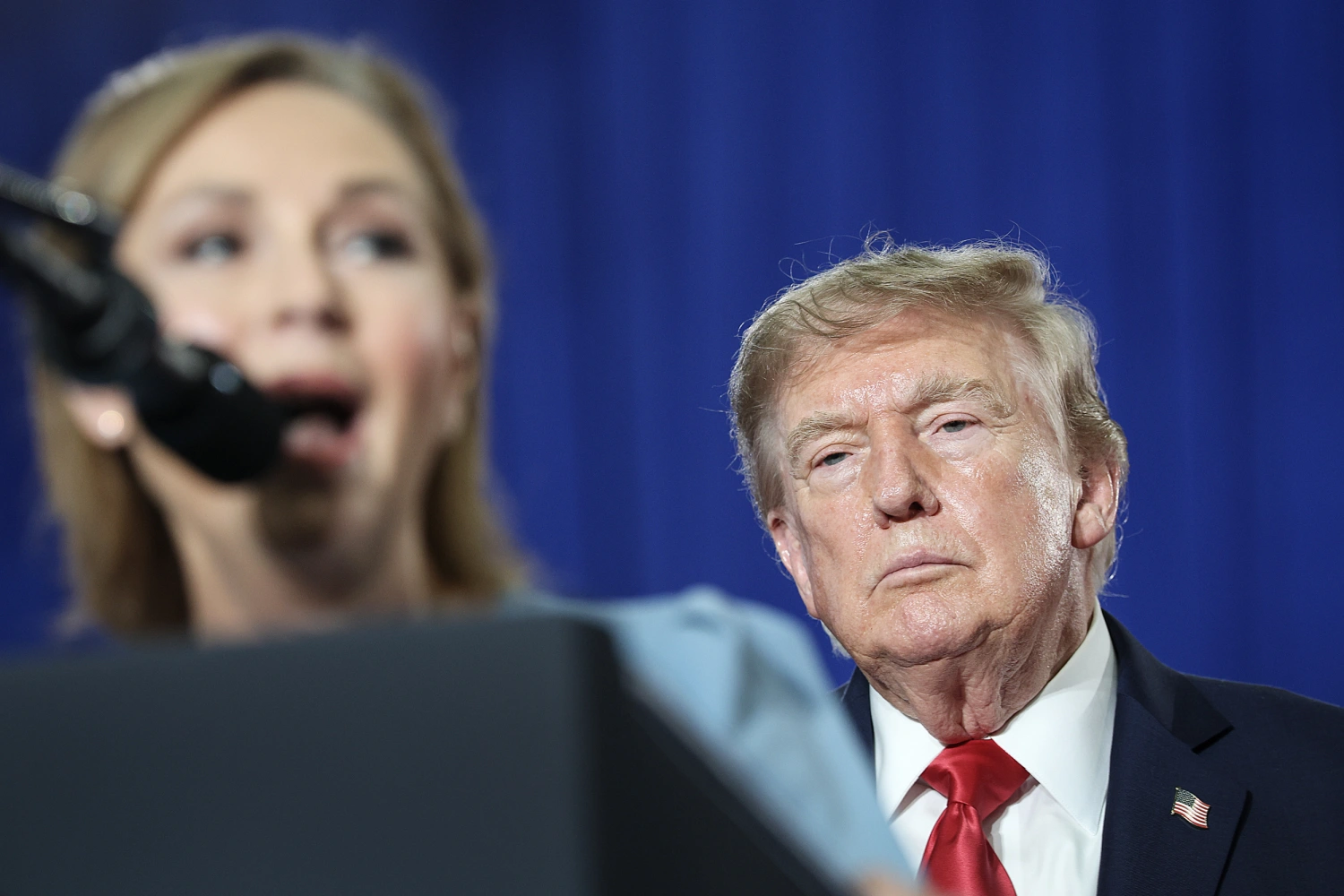 U.S. President Donald Trump listens to U.S. Sen. Darline Graham (R-SC) during a campaign rally on August 21, 2026 in Myrtle Beach, S.C.
