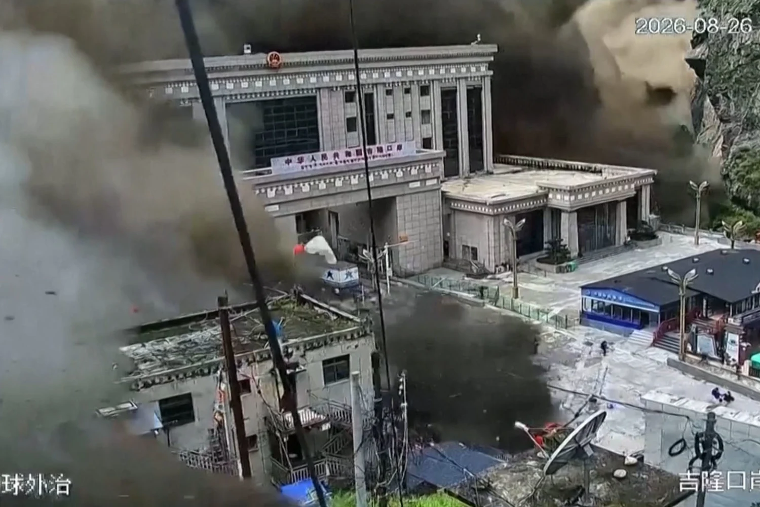 Surveillance footage shows people attempting to flee moments before a devastating mudslide strikes Tibet's Gyirong.