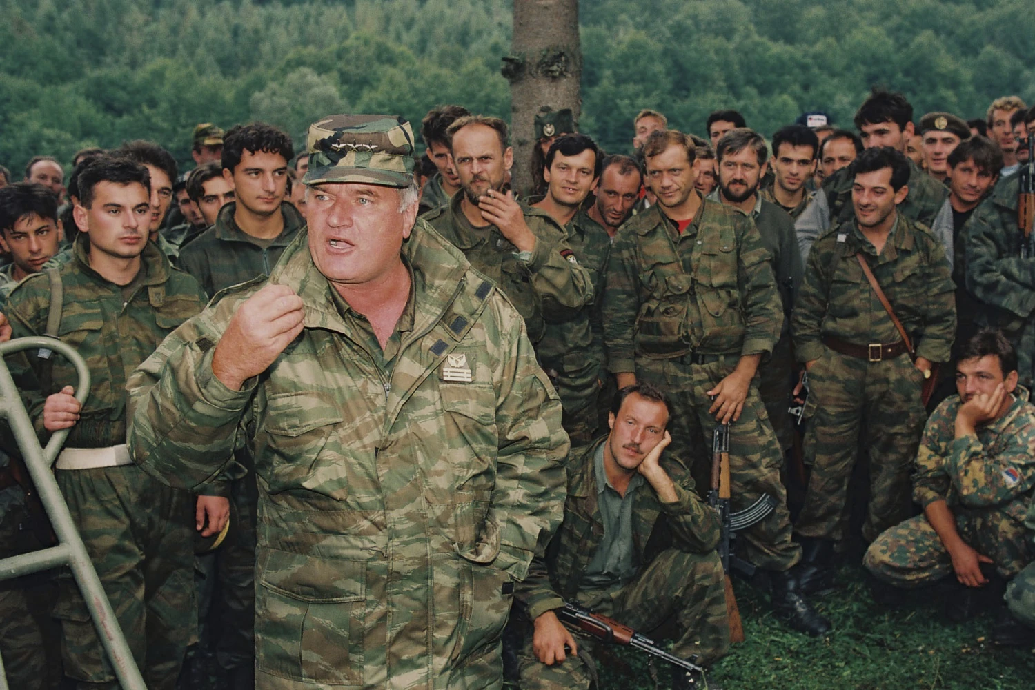 Bosnian Serb General Ratko Mladic speaks to soldiers near the Bosnian town of Cazin on Sept. 4, 1994.