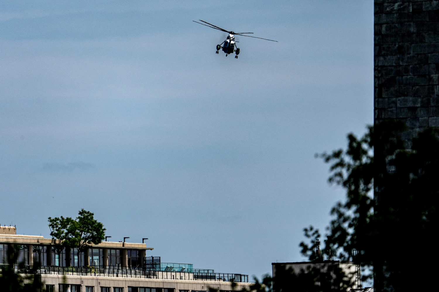 Marine One, with President Donald Trump aboard, flies past the Washington Monument on Aug. 4, 2026.