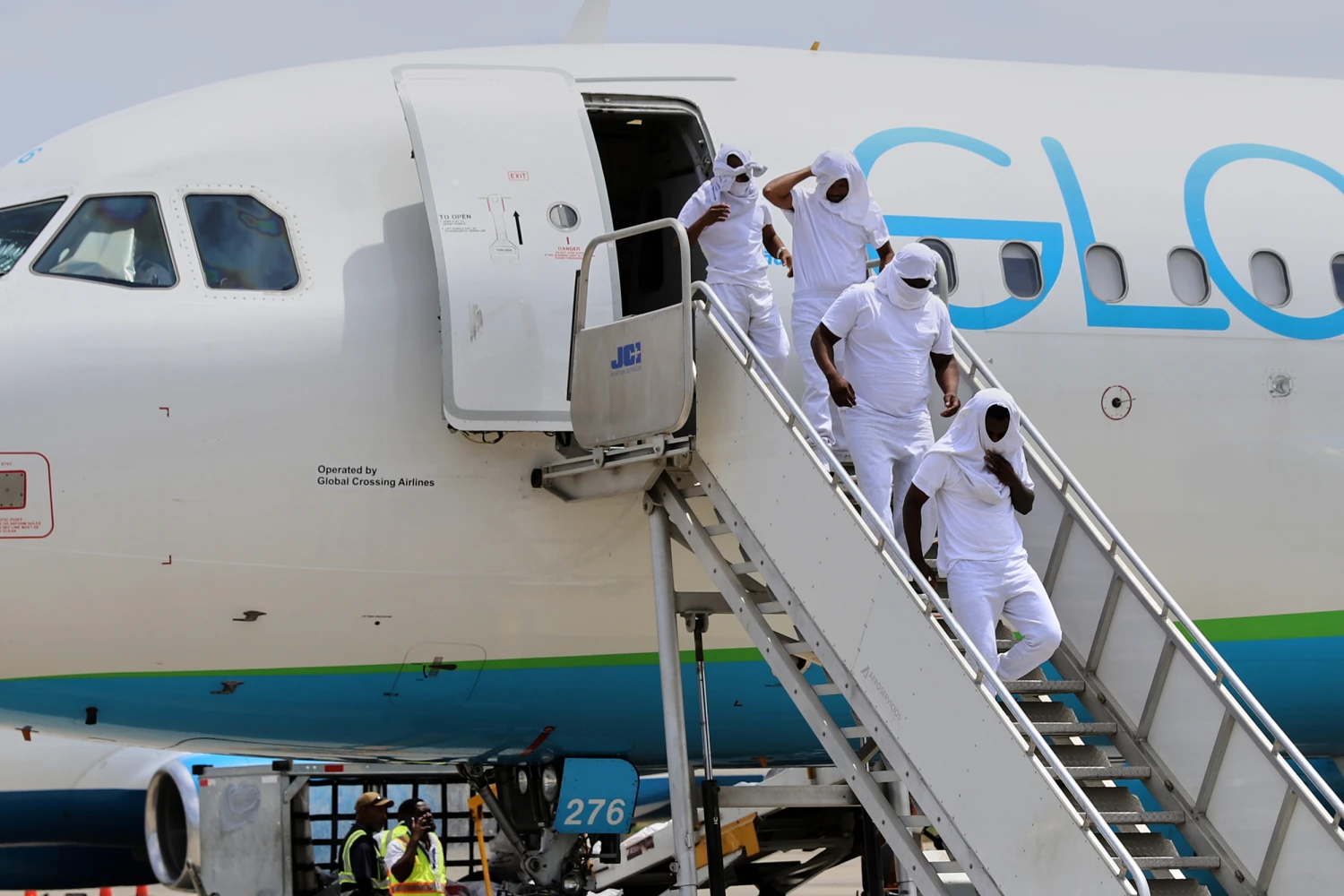 Haitians deported from the United States deplane at the international airport in Cap-Haitien, Haiti, Thursday, Aug. 27, 2026.