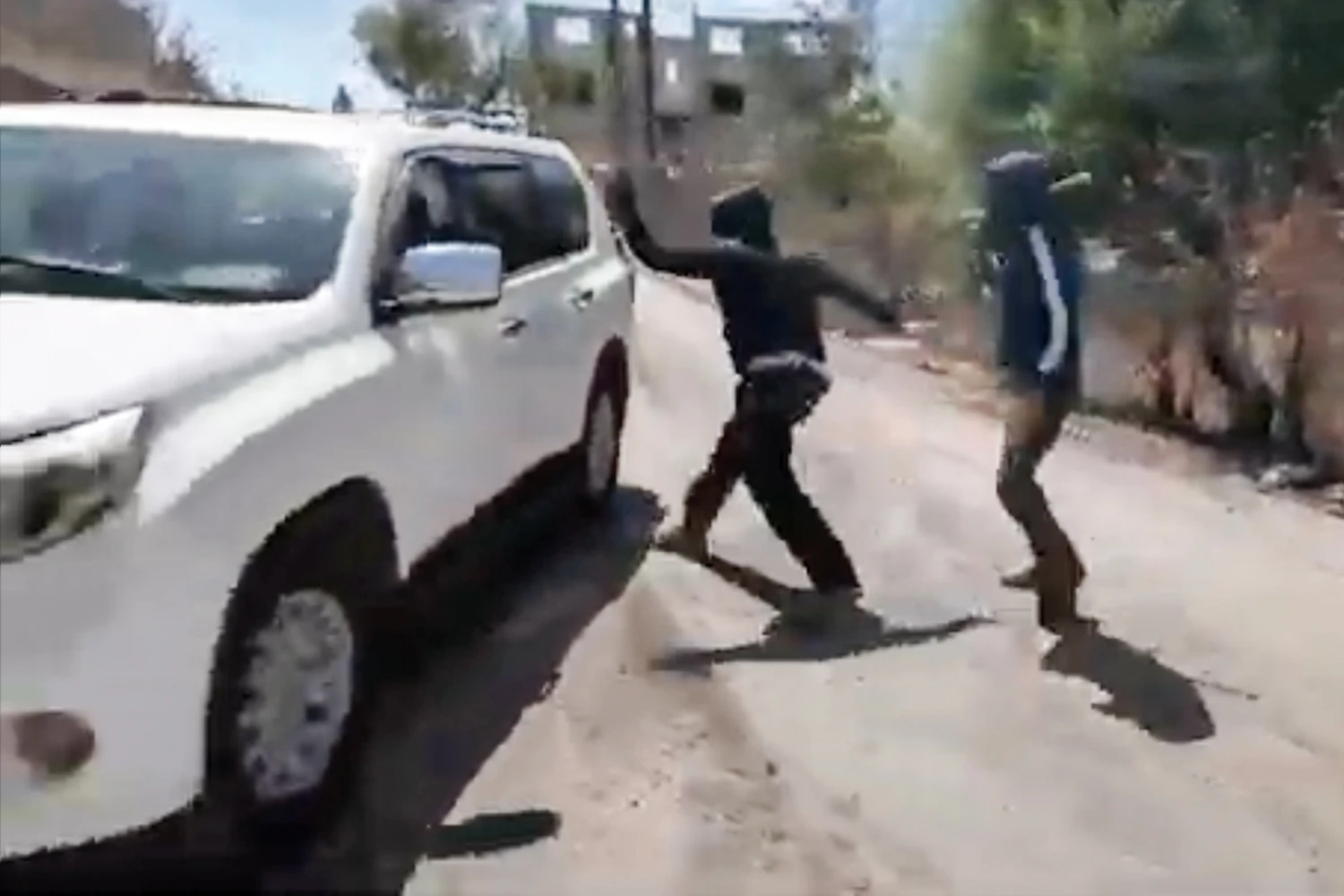 NBC News journalists were attacked by masked Israeli settlers in the West Bank on Saturday.