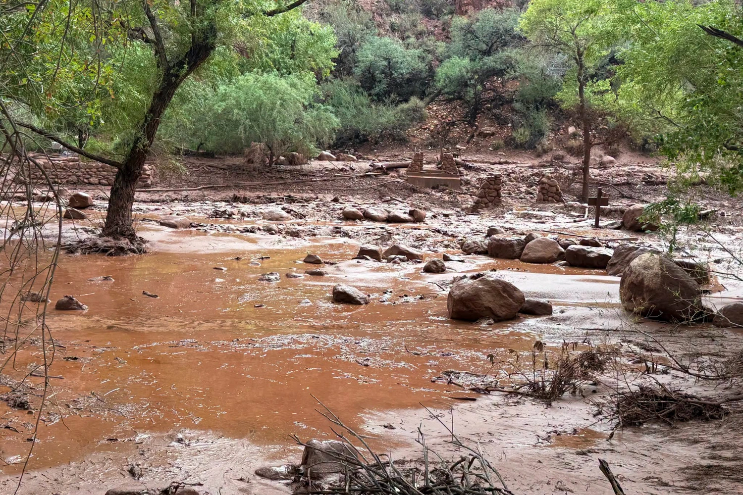 Remnants of stone bridge pylons remain along Bright Angel Creek following a flash flood that destroyed the footbridge on Aug. 29.