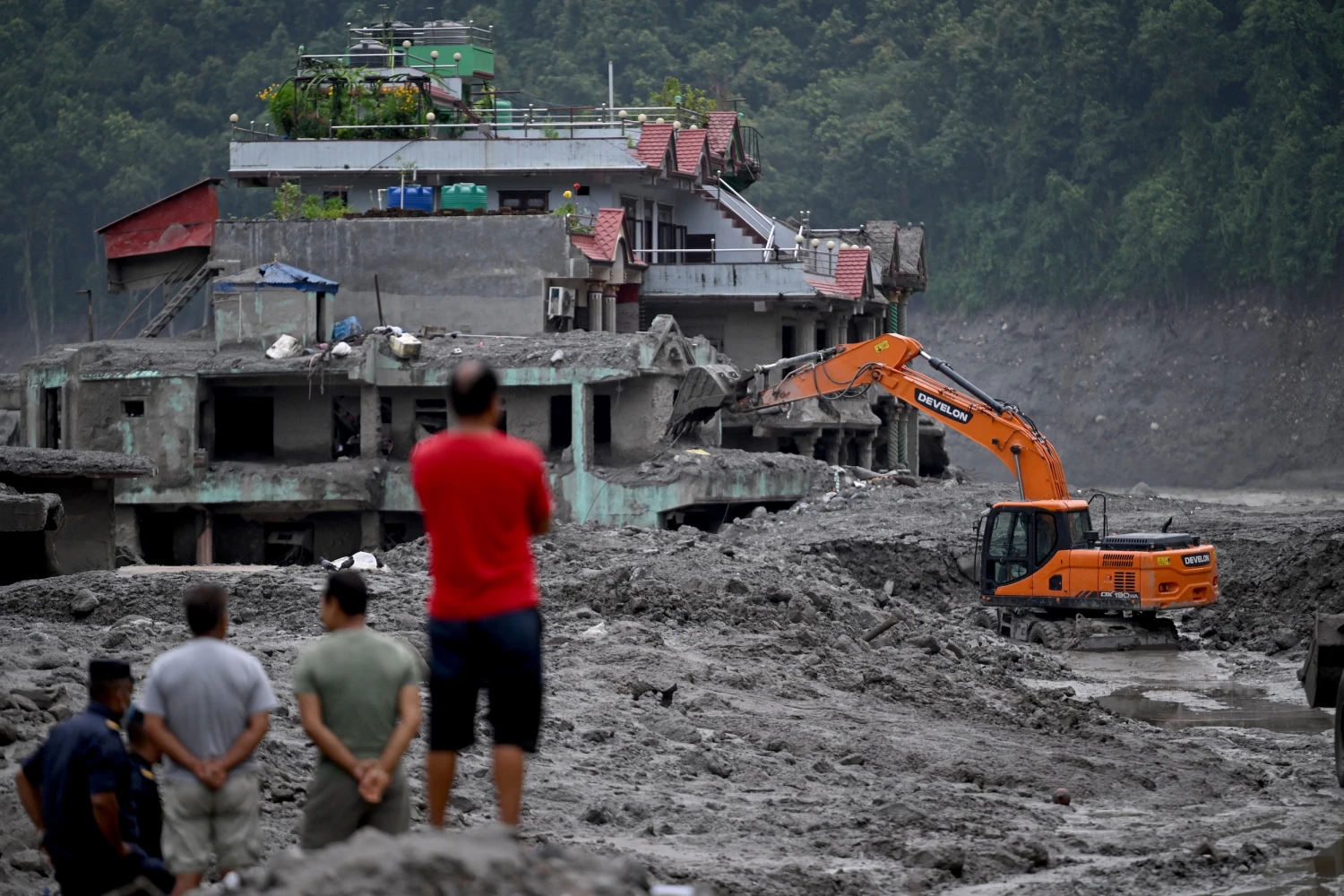 Rescue work continue in the aftermath of flash floods at Trishuli Center, in Nepal's Nuwakot district on Aug. 31, 2026.