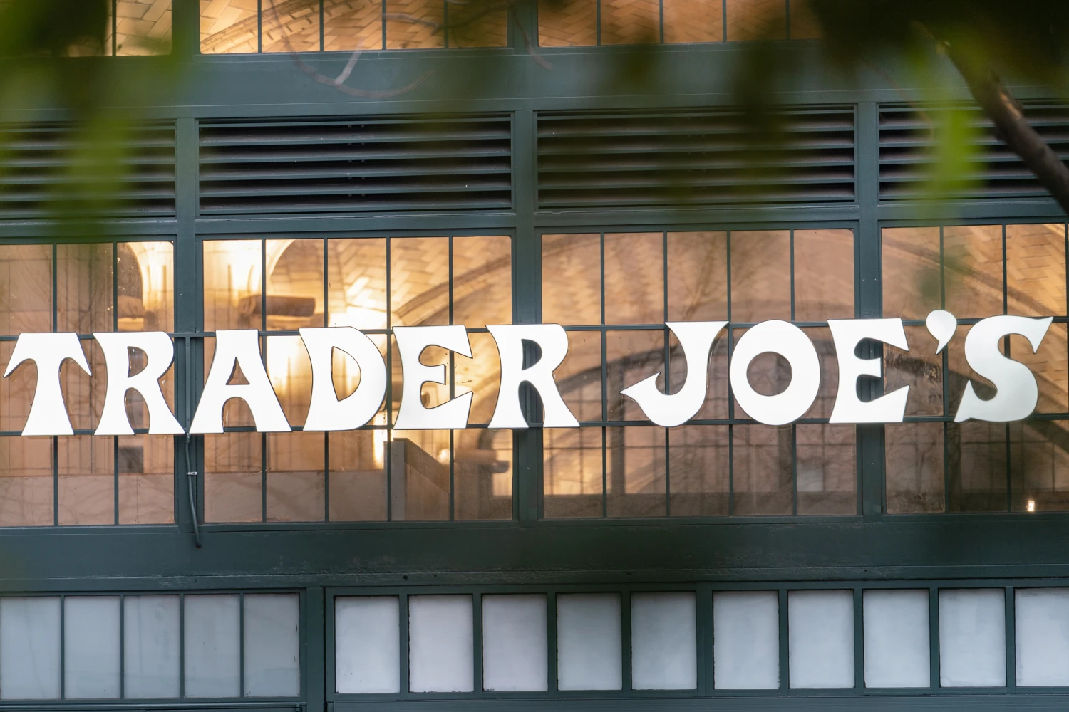 Signage outside the Trader Joe's Upper East Side Bridgemarket grocery store in New York, U.S., on Thursday, Dec. 2, 2021.