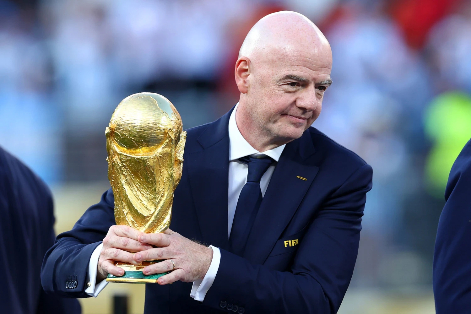 FIFA President Gianni Infantino holds the World Cup trophy after Spain won the final on July 19, 2026, in New Jersey.