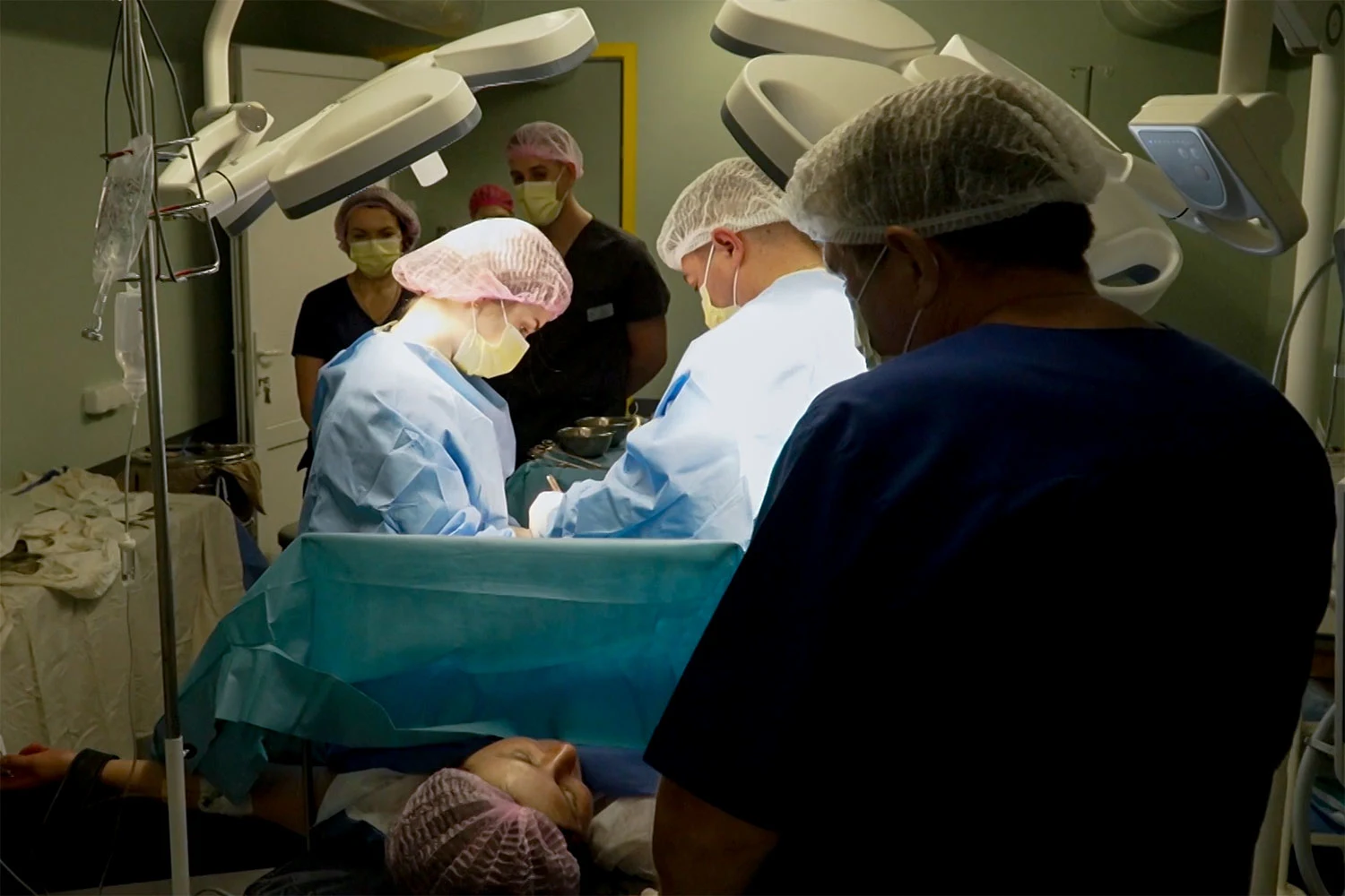 Surgeons deliver Maryna's baby at an underground hospital in Kharkiv, Ukraine on Sept. 2, 2026.