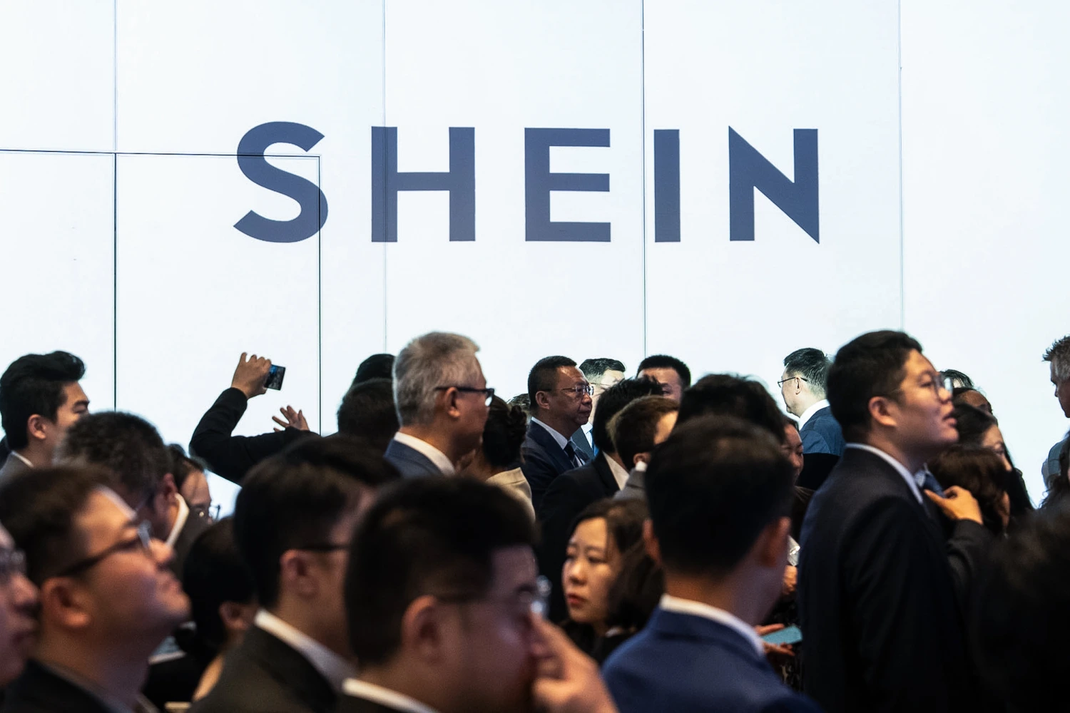 A logo of fast-fashion online retailer Shein is displayed at the listing ceremony in Hong Kong, Tuesday, Sept. 1, 2026.