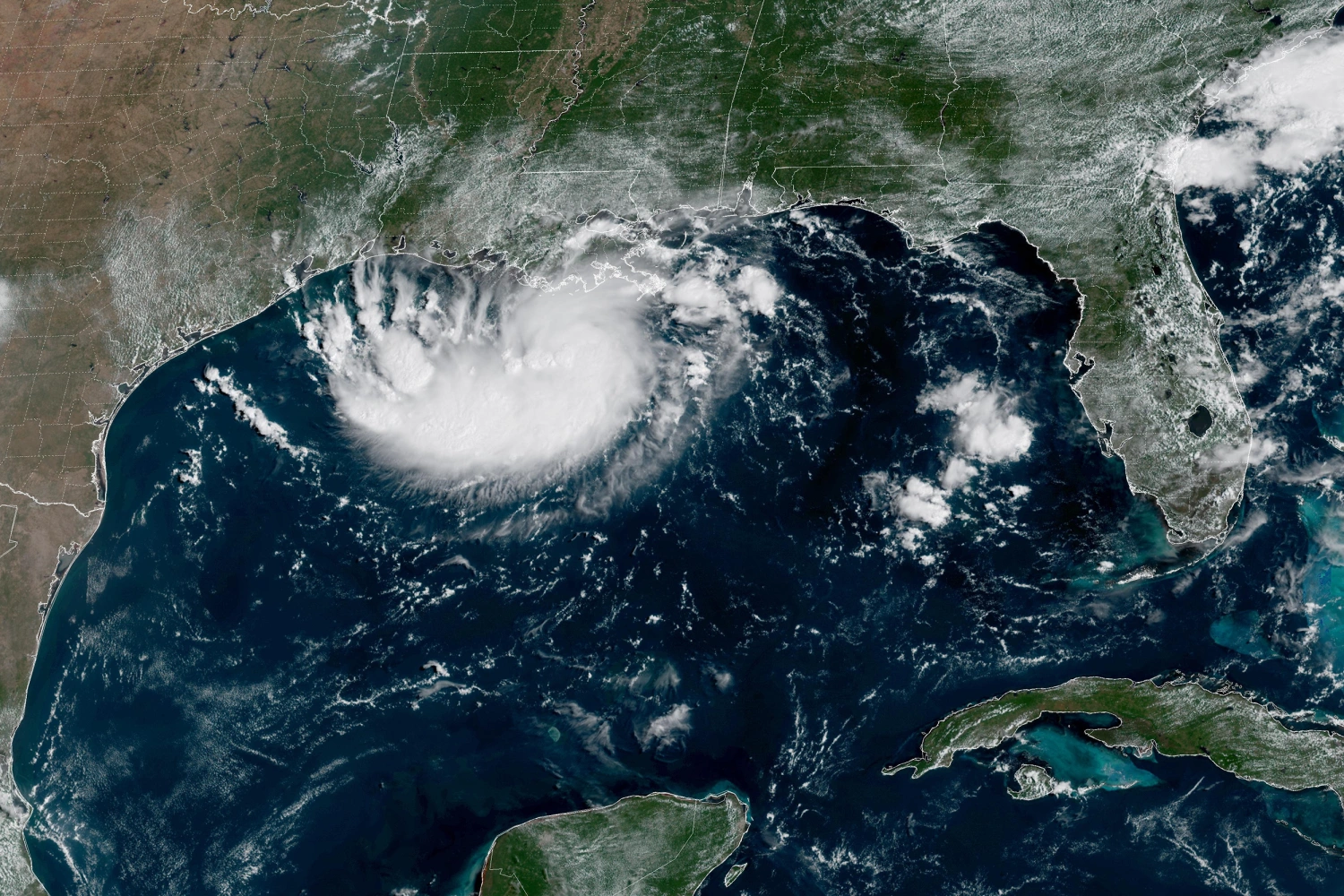 This satellite image released by NOAA shows Potential Tropical Cyclone Five forming over the Gulf of Mexico on Monday, Aug. 31, 2026.