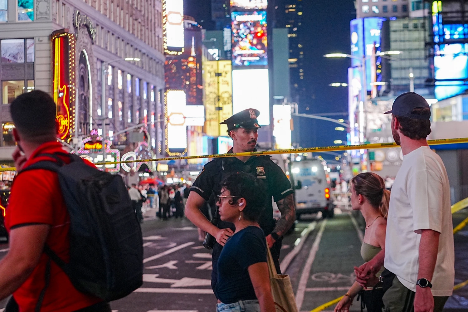 New York Police Department officers investigate the scene in Times Square on Aug. 31, 2026.