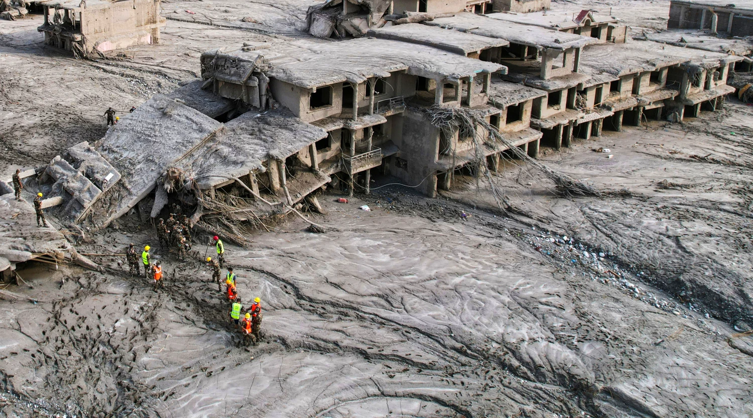 Rescue workers in Nepal's Nuwakot district on Aug. 29, 2026, after flash flooding along the Trishuli River.