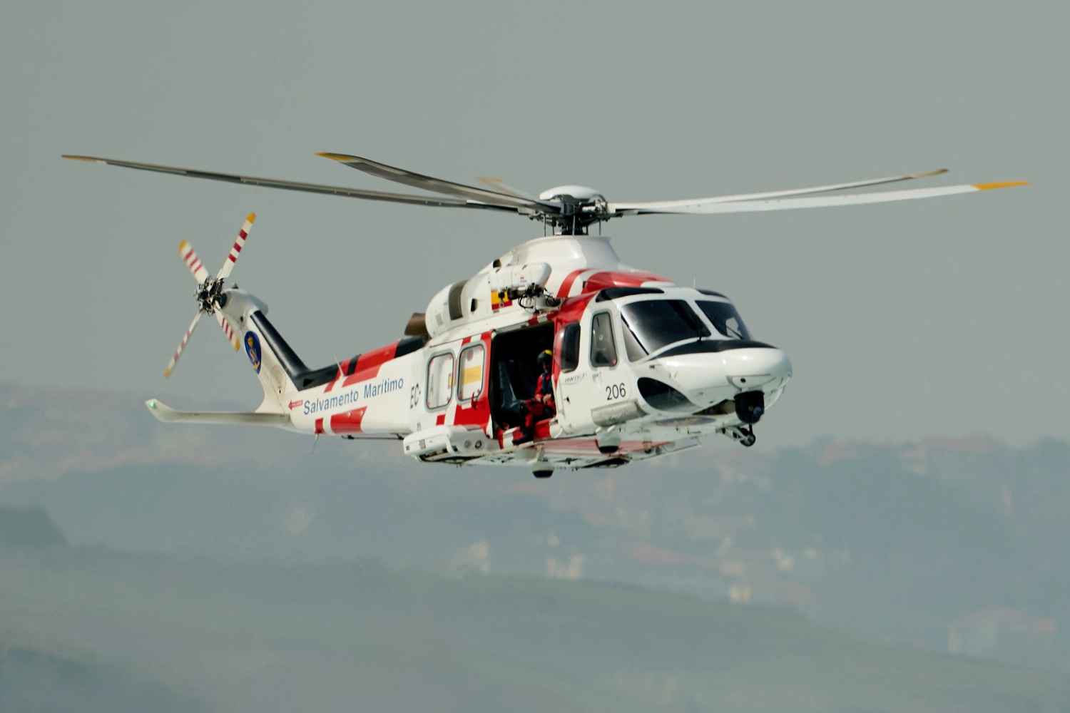 A Spanish Maritime Rescue helicopter.