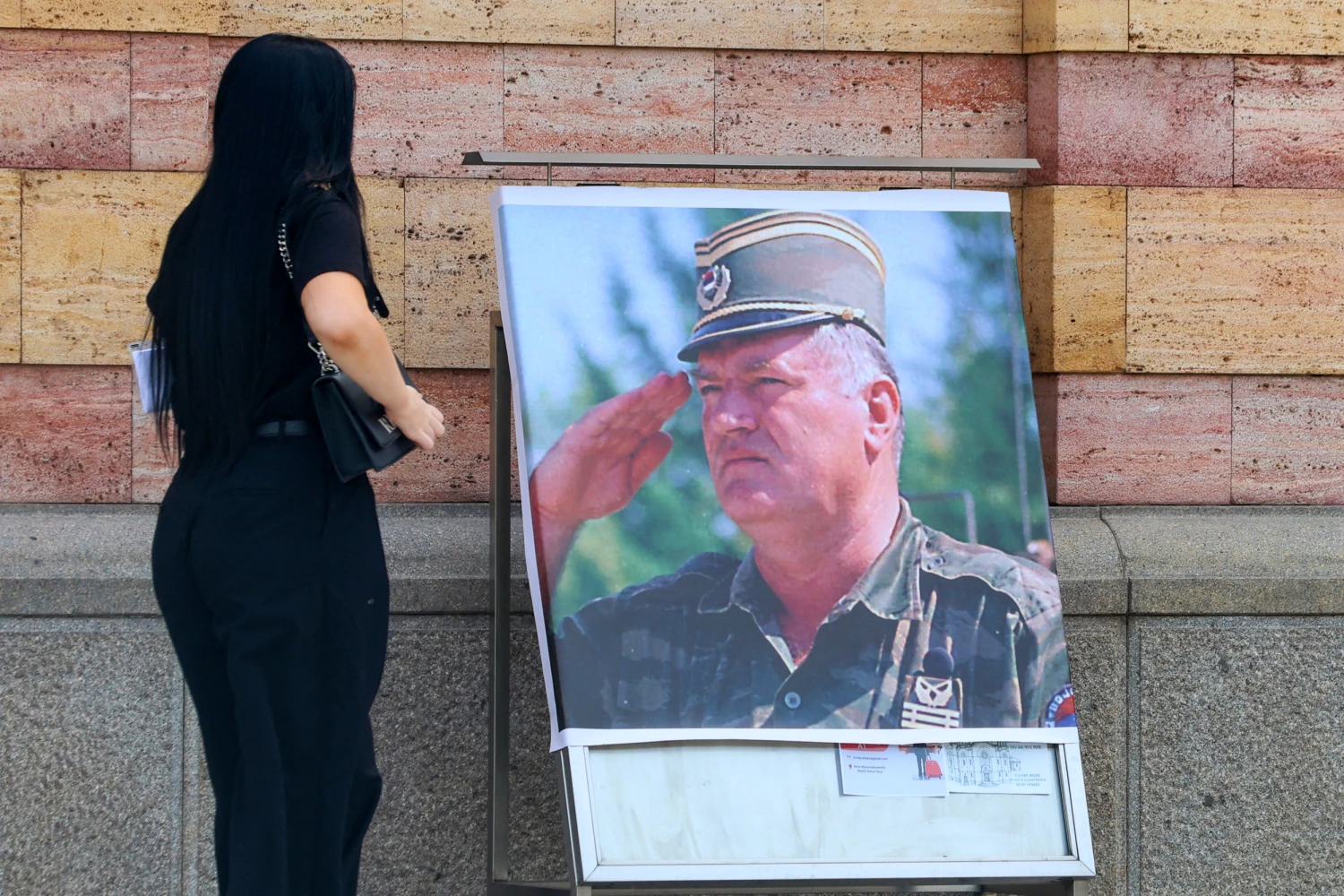 A poster of former Bosnian Serb military chief Ratko Mladic outside the Orthodox Cathedral in Banja Luka, Bosnia, on Aug. 28, 2026, one day after his death.
