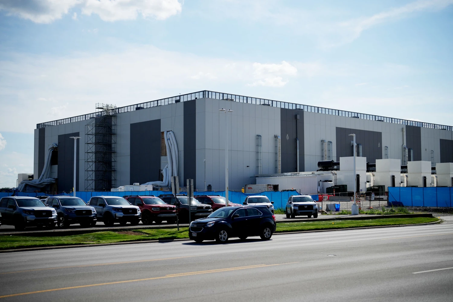 For many living in neighboring areas, the construction of data centers like this one in Sandusky, Iowa, has become another example of the powerful taking advantage of the powerless.
