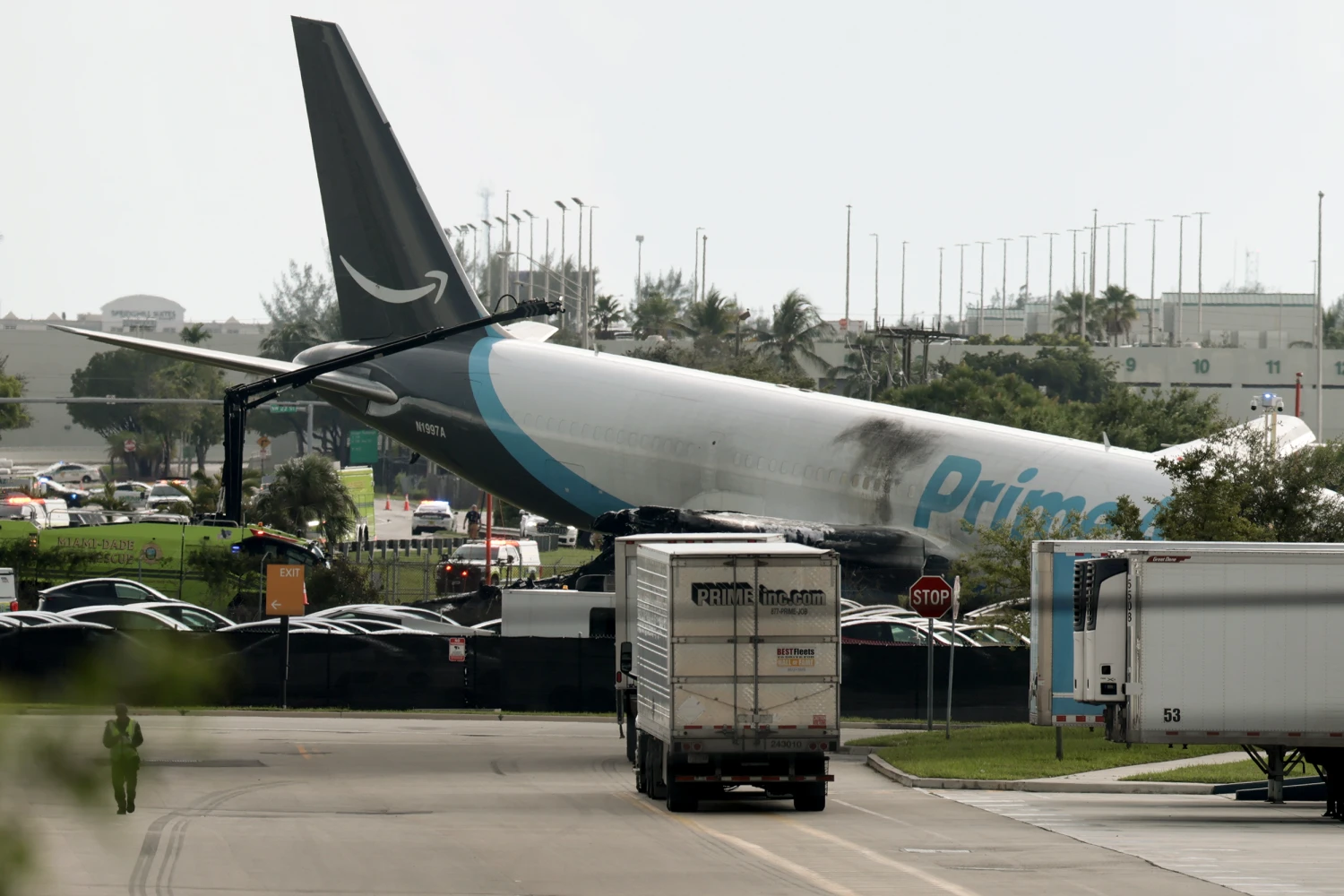 An Amazon-branded cargo plane after it crashed at Miami International Airport on Sunday.